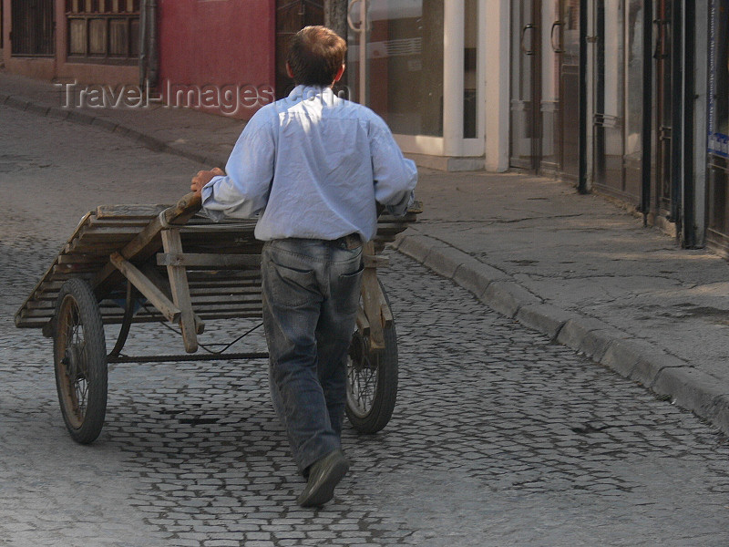 kosovo4: Kosovo - Prizren / Prizreni: man with a barrow / push cart / trolley - photo by J.Kaman - (c) Travel-Images.com - Stock Photography agency - Image Bank