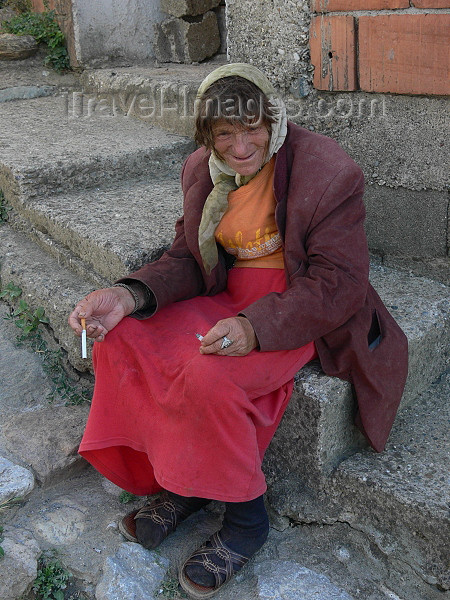 kosovo74: Kosovo - Prizren / Prizreni: old lady with a cigarette - photo by J.Kaman - (c) Travel-Images.com - Stock Photography agency - Image Bank