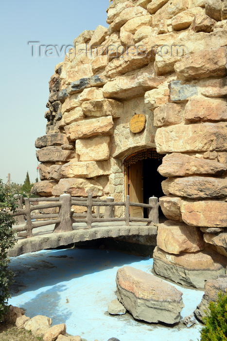 kurdistan67: Erbil / Hewler, Kurdistan, Iraq: Shanadar Park - bridge over a dry moat, leading to a fake cave - evoques Shanidar Cave, an archaeological site in the Zagros Mountains that yielded the first adult Neanderthal skeletons in Iraq - photo by M.Torres - (c) Travel-Images.com - Stock Photography agency - Image Bank