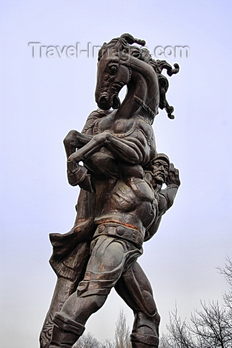 kyrgyzstan50: Bishkek, Kyrgyzstan: a man carries his horse - statue at the Palace of Sports - Togolok Moldo street - photo by M.Torres - (c) Travel-Images.com - Stock Photography agency - Image Bank