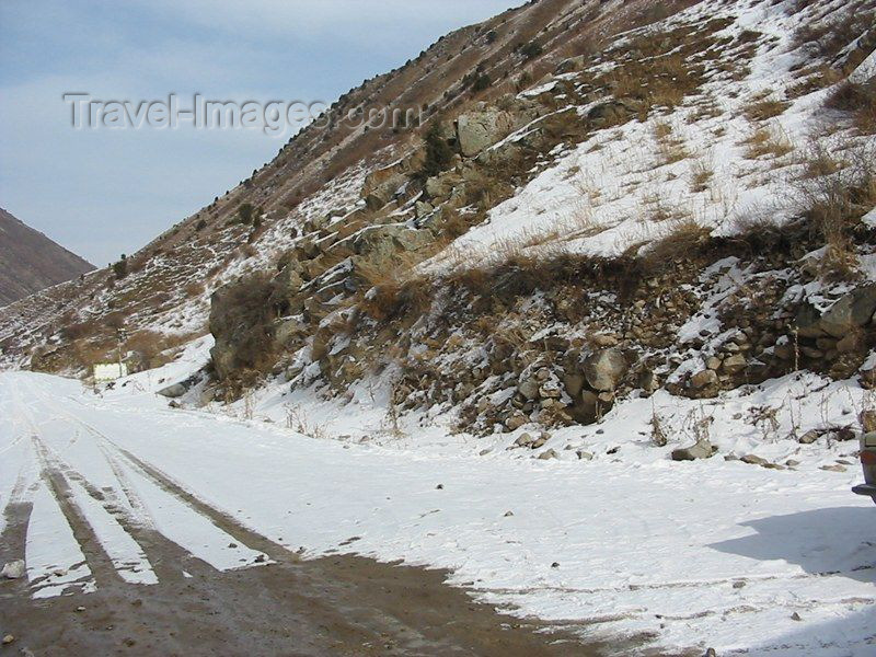 kyrgyzstan7: Kyrgyzstan - Chuy oblast: mountain road with snow - winter scene - Central Asian climate - photo by D.Ediev - (c) Travel-Images.com - Stock Photography agency - Image Bank