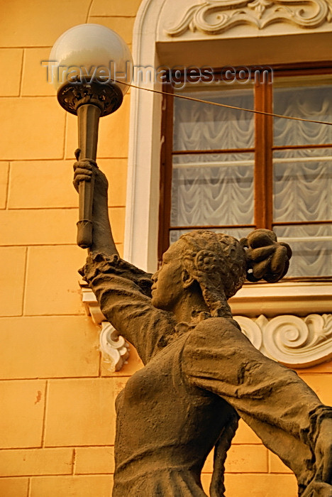 kyrgyzstan71: Bishkek, Kyrgyzstan: Opera and Ballet Theater - gracious statue carrying a lamp, contrasts with the stern Soviet architecture - Y.Abdrakhmanov street - photo by M.Torres - (c) Travel-Images.com - Stock Photography agency - Image Bank