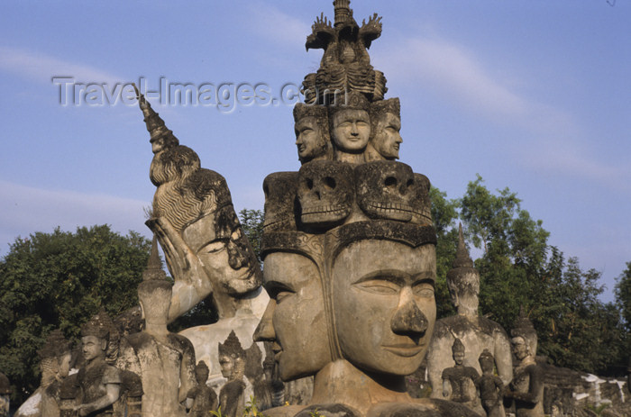 laos89: Laos - Laos - Vientiane (Viangchan province): Xieng Khuan Buddha Park - double face and skulls - religion - Buddhism - photo by Walter G Allgöwer - Der Skupturenpark mit meterhohen Betonfiguren wurde 1958 von dem laotischen Künstler Boun Leua Soulilat ers - (c) Travel-Images.com - Stock Photography agency - Image Bank