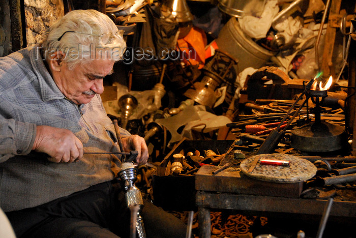 lebanon66: Lebanon, Sidon: artisan fixing a hookah water pipe in workshop - photo by J.Pemberton - (c) Travel-Images.com - Stock Photography agency - Image Bank