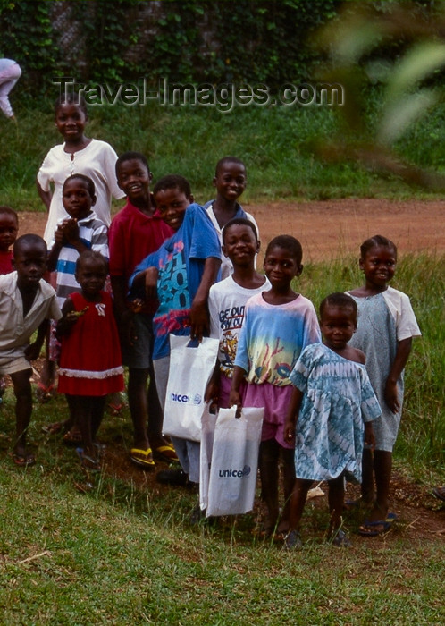 liberia36: Grand Bassa County, Liberia, West Africa: happy kids after getting gifts from UNICEF - photo by M.Sturges - (c) Travel-Images.com - Stock Photography agency - Image Bank