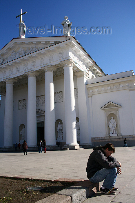 lithuania159: Lithuania - Vilnius: man sitting - cathedral square - photo by Sandia - (c) Travel-Images.com - Stock Photography agency - Image Bank