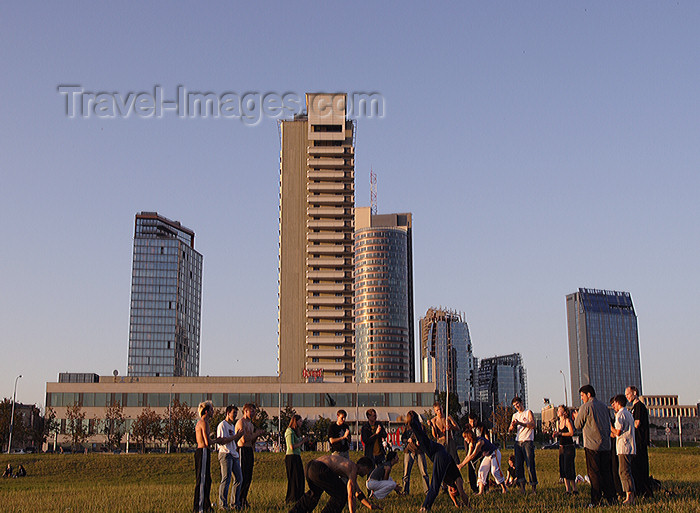 lithuania188: Lithuania - Vilnius: young people dancing near the river Neris - business district towers - photo by Sandia - (c) Travel-Images.com - Stock Photography agency - Image Bank