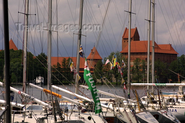 lithuania36: Lithuania - Trakai: masts - Galve Lake - yachts and Trakai castle - photo by A.Dnieprowsky - (c) Travel-Images.com - Stock Photography agency - Image Bank