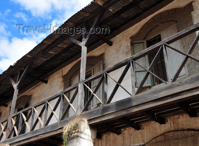 madagascar140: Moramanga, Alaotra-Mangoro, Toamasina Province, Madagascar: timber balcony - Malagasy architecture - photo by M.Torres - (c) Travel-Images.com - Stock Photography agency - Image Bank