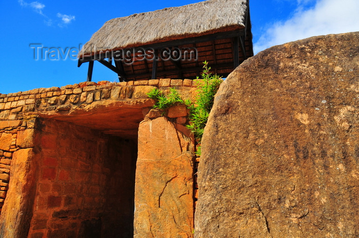 madagascar205: Ambohimanga Rova, Antananarivo-Avaradrano, Analamanga region, Antananarivo province, Madagascar: Royal Hill of Ambohimanga - Ambatamitsangana gate - the 10 ton stone disc used as door was once moved by 40 slaves - royal city and burial site - UNESCO world heritage site - photo by M.Torres - (c) Travel-Images.com - Stock Photography agency - Image Bank