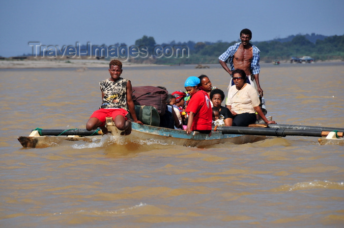 madagascar228: Tsimafana, Belo sur Tsiribihina,  Menabe Region, Toliara Province, Madagascar: small trimaran for public transportation - river Tsiribihina - family on a boat - photo by M.Torres - (c) Travel-Images.com - Stock Photography agency - Image Bank