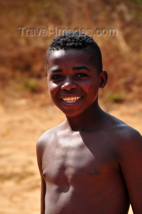 madagascar254: West coast road between the Manambolo river and Belon'i Tsiribihina, Toliara Province, Madagascar: boy with a broad smile - photo by M.Torres - (c) Travel-Images.com - Stock Photography agency - Image Bank