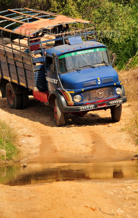 madagascar256: West coast road between the Manambolo river and Belon'i Tsiribihina, Toliara Province, Madagascar: a Taxi Brousse negotiates a small river - Mercedes-Benz truck  - photo by M.Torres - (c) Travel-Images.com - Stock Photography agency - Image Bank