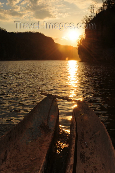 madagascar280: Antsalova district, Melaky region, Mahajanga province, Madagascar: Manambolo River - double dugout canoe and the rising sun - photo by M.Torres - (c) Travel-Images.com - Stock Photography agency - Image Bank