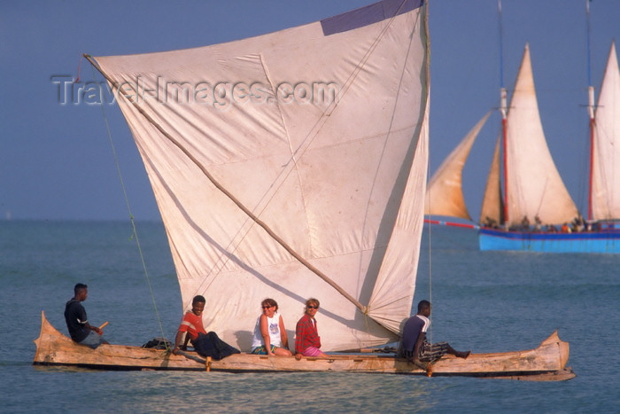 madagascar7: Morondava, Region of Menabe, province of Toliara, western Madagascar: tourists enjoy sailing on a traditional outrigger canoe - photo by R.Eime - (c) Travel-Images.com - Stock Photography agency - Image Bank