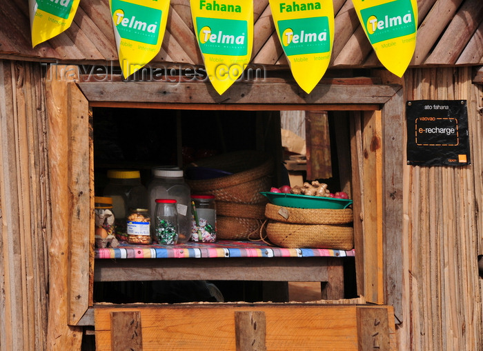 madagascar72: Vohilava, Île Sainte Marie / Nosy Boraha, Analanjirofo region, Toamasina province, Madagascar: products at the local general store, from food to communications - Telma banners - photo by M.Torres - (c) Travel-Images.com - Stock Photography agency - Image Bank