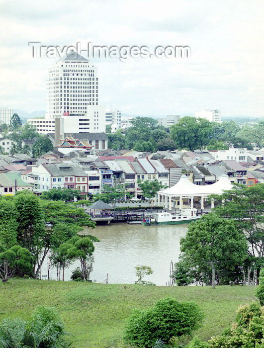 mal24: Malaysia - Kuching - Sarawak (Borneo): old and new skylines - view from Fort Margherita (now the Police Museum) across the Sarawak River (photo by Rod Eime) - (c) Travel-Images.com - Stock Photography agency - Image Bank