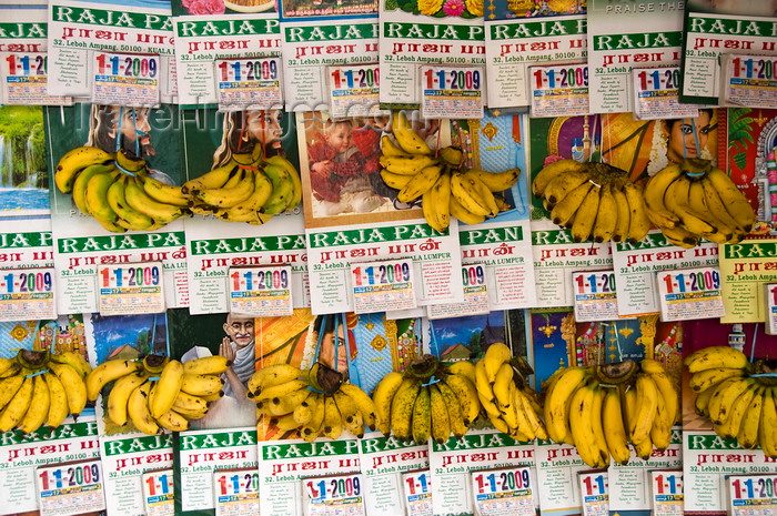 mal28: Kuala Lumpur, Malaysia: calendars and bananas - shop in Little India - photo by J.Pemberton - (c) Travel-Images.com - Stock Photography agency - Image Bank