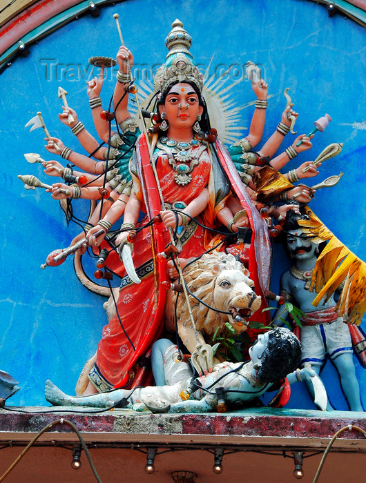 mal443: Kali Amman Temple - goddess Devi, mounted on a lion, fighting against evil, Pulau Pankor Island, Malaysia.

 photo by B.Lendrum - (c) Travel-Images.com - Stock Photography agency - Image Bank