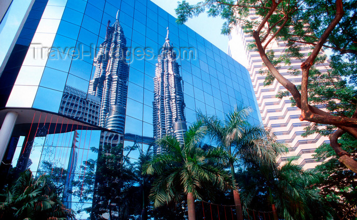 mal483: Petronas towers reflected, KLCC, Kuala Lumpur, Malaysia. - photo by B.Lendrum - (c) Travel-Images.com - Stock Photography agency - Image Bank