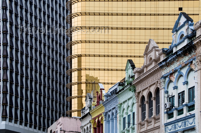 mal502: Kuala Lumpur, Malaysia: old shopfronts in front of new skyscrapers - photo by J.Pemberton - (c) Travel-Images.com - Stock Photography agency - Image Bank