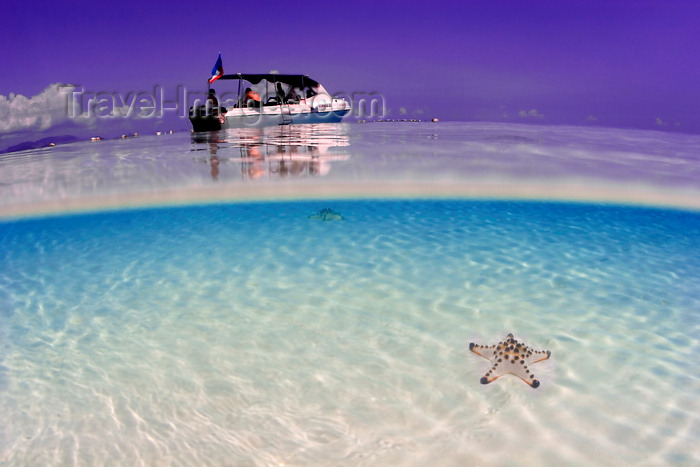 mal595: Pulau Mabul, Sabah, Borneo, Malaysia: diveboat in shallow clear blue water with starfish in the white sand - photo by S.Egeberg - (c) Travel-Images.com - Stock Photography agency - Image Bank