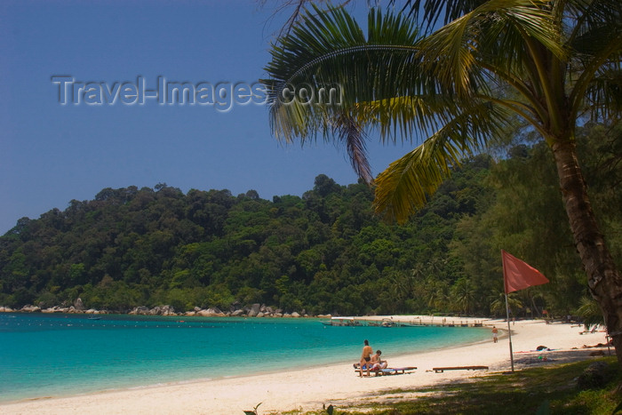 mal623: Perhentian Island, Terengganu, Malaysia: Perhentian Island Resort - Teluk Pauh - PIR- two people on white sandy beach lined by vegetation - photo by S.Egeberg - (c) Travel-Images.com - Stock Photography agency - Image Bank