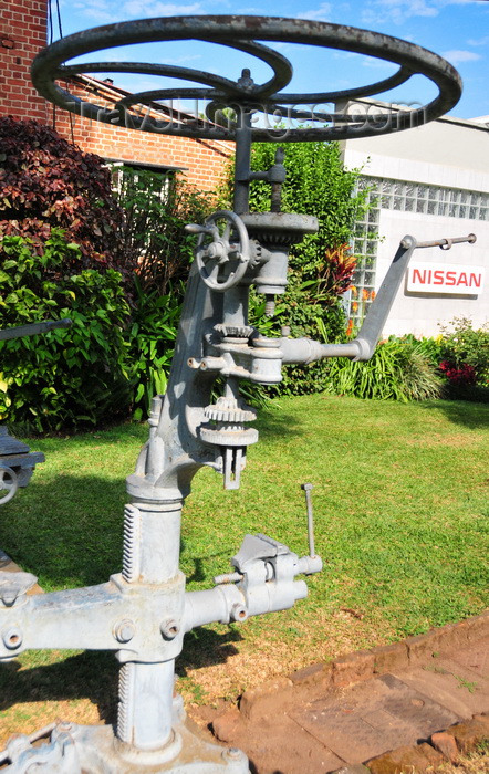 malawi60: Blantyre, Malawi: old machinery - Mandala Manager's House, owned by CFAO, Compagnie Française de l'Afrique Occidentale - Nissan in the background - photo by M.Torres - (c) Travel-Images.com - Stock Photography agency - Image Bank