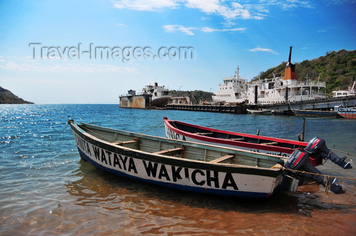 malawi76: Monkey Bay / Lusumbwe, Malawi: fishing boats with outboard engines, 'Ckiuta Wataya Wakicha', dry docks and MV Mtendere - Lake Malawi / Nyasa, Nankumba Peninsula - photo by M.Torres - (c) Travel-Images.com - Stock Photography agency - Image Bank