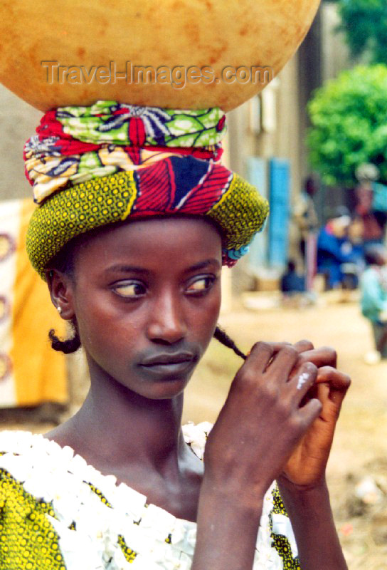 mali36: Djenné, Mopti Region, Mali: coquette girl with water pot - photo by N.Cabana - (c) Travel-Images.com - Stock Photography agency - Image Bank