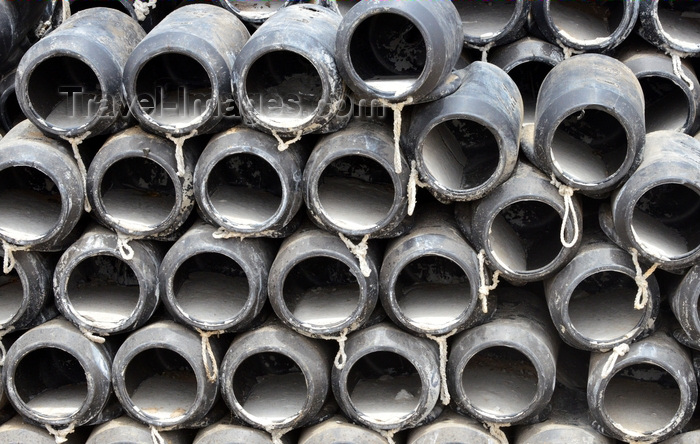 mauritania34: Nouakchott, Mauritania: stack of plastic octopus traps - small cylindrical containers used as shelter by the deceived octopus - each pot contains some concrete, the ballast - fishing harbor- photo by M.Torres - (c) Travel-Images.com - Stock Photography agency - Image Bank