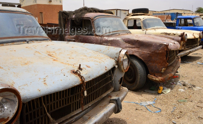 mauritania40: Nouakchott, Mauritania: rusting 1960s French pick-up trucks by the fishing harbor - Peugeot 404 - photo by M.Torres - (c) Travel-Images.com - Stock Photography agency - Image Bank