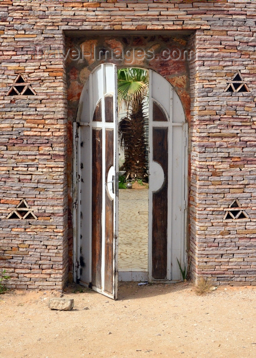 mauritania58: Nouakchott, Mauritania: building gate with traditional Mauritanian stone masonry - Fondation National Pour la Sauvegarde des Villes Anciennes - photo by M.Torres - (c) Travel-Images.com - Stock Photography agency - Image Bank