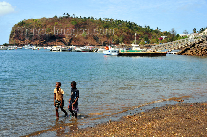 mayotte5: Mamoudzou, Grande-Terre / Mahore, Mayotte: kids walk along the beach - Pointe Mahabou in the background - photo by M.Torres - (c) Travel-Images.com - Stock Photography agency - Image Bank