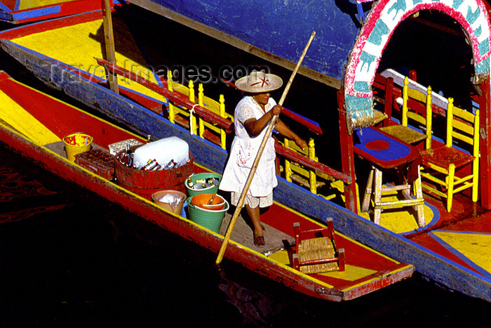 mexico349: Xochimilco, DF: indian woman in a trajinera canoe, near a chalupa - photo by Y.Baby - (c) Travel-Images.com - Stock Photography agency - Image Bank