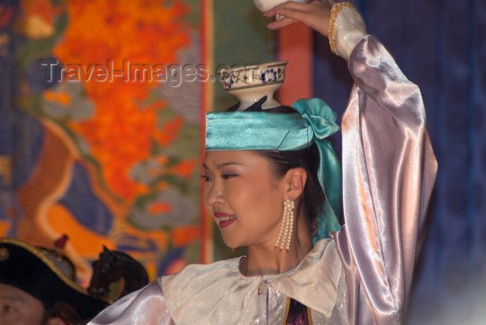 mongolia10: Mongolia - Ulaan Baator / ULN / Ulan Bator: folk evening - dancer with vase - photo by A.Summers - (c) Travel-Images.com - Stock Photography agency - Image Bank