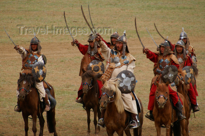 mongolia156: Ulan Bator / Ulaanbaatar, Mongolia: cavalry charge to celebrate the 800th anniversary of the Mongolian state - sabres - photo by A.Ferrari - (c) Travel-Images.com - Stock Photography agency - Image Bank