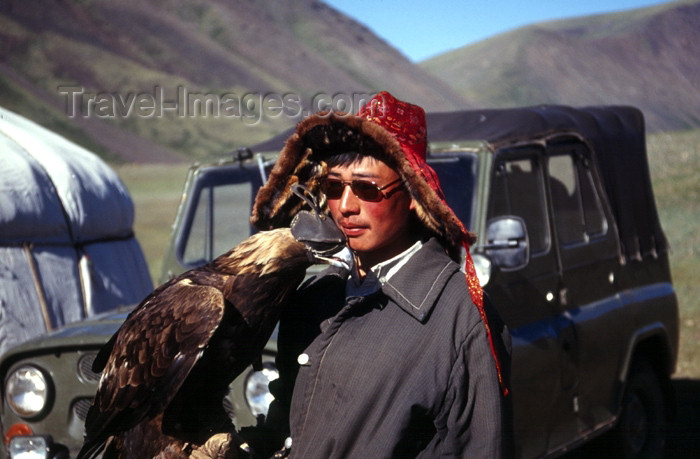 mongolia49: Mongolia - Altai - western Mongolia: Kazakh eagle hunter and Russian Jeep - photo by A.Summers - (c) Travel-Images.com - Stock Photography agency - Image Bank