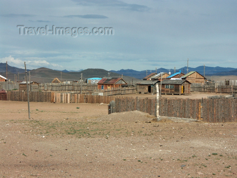 mongolia92: Mongolia - Burgun, Bayan-Ölgiy Aymag:  Simple wooden houses surrounded by stockades - photo by P.Artus - (c) Travel-Images.com - Stock Photography agency - Image Bank