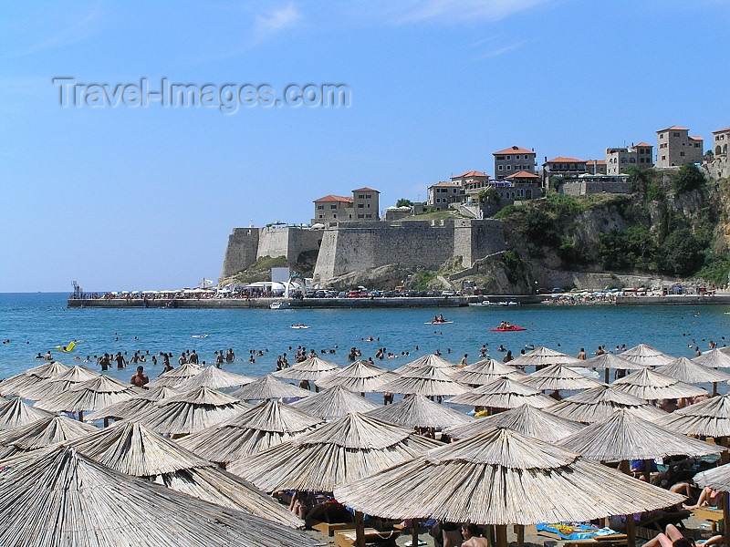 montenegro12: Montenegro - Crna Gora  - Ulcinj / Dulcigno / Ulqin: fortress where Miguel de Cervantes was held hostage and beach umbrellas - photo by J.Kaman - photo by J.Kaman - (c) Travel-Images.com - Stock Photography agency - Image Bank