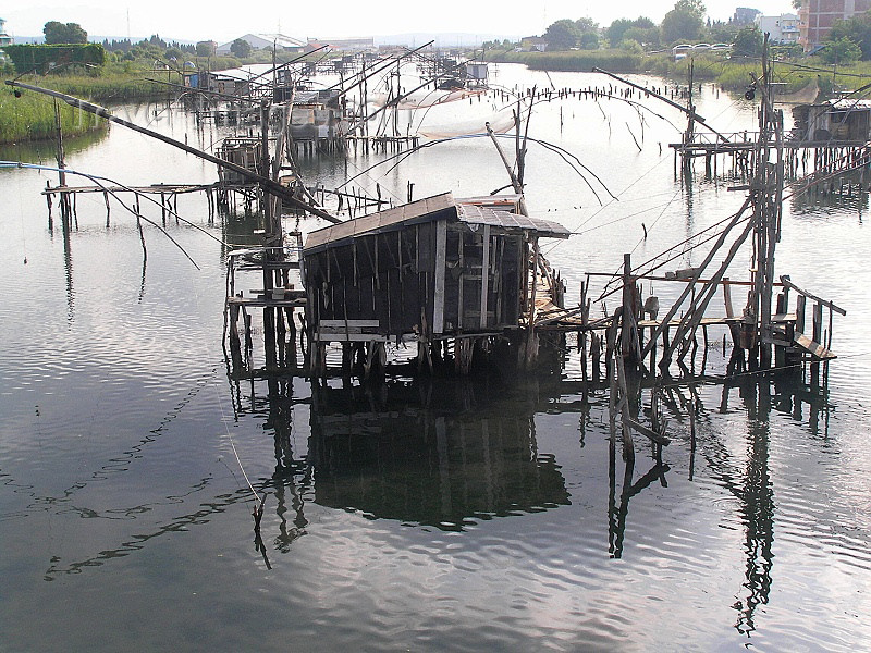 montenegro78: Montenegro - Crna Gora - Bojana river / river Buna: traditional fishing nets and fishing huts - border with Albania - Ulcinj municipality - photo by J.Kaman - (c) Travel-Images.com - Stock Photography agency - Image Bank