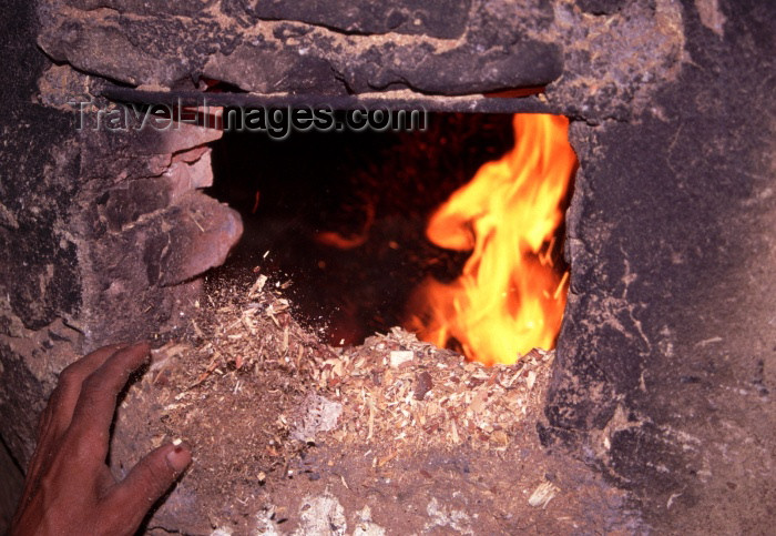 moroc102: Morocco / Maroc - Fès: the baths - keeping the flame alive - photo by F.Rigaud  - (c) Travel-Images.com - Stock Photography agency - Image Bank