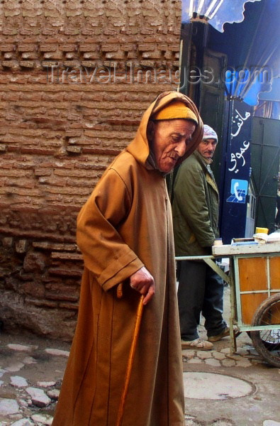 moroc164: Morocco / Maroc - Fez: man with a cane and jallaba - photo by J.Kaman - (c) Travel-Images.com - Stock Photography agency - Image Bank