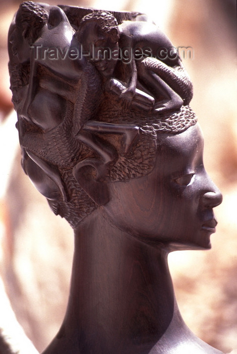 mozambique192: Pemba / Porto Amélia, Cabo Delgado, Mozambique / Moçambique: wooden bust - woman with men on her head - Maconde art / escultura Maconde - busto - photo by F.Rigaud - (c) Travel-Images.com - Stock Photography agency - Image Bank