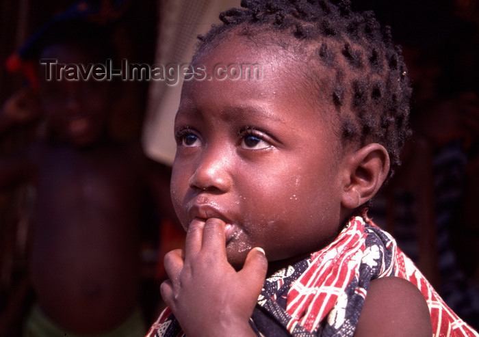 mozambique194: Pemba / Porto Amélia, Cabo Delgado, Mozambique / Moçambique: toddler with fingers in her mouth / criança com os dedos na boca - photo by F.Rigaud - (c) Travel-Images.com - Stock Photography agency - Image Bank