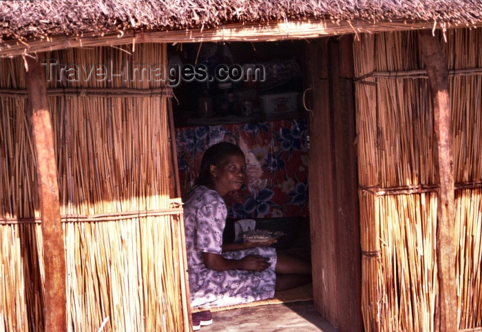 mozambique86: Mozambique / Moçambique - Bazaruto island: lady in a traditional house / mulher numa cabana- photo by F.Rigaud - (c) Travel-Images.com - Stock Photography agency - Image Bank