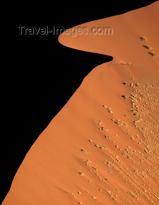 Namibia: half silhouetted sand dune from hot air balloon, Sossusvlei (photo by B.Cain)