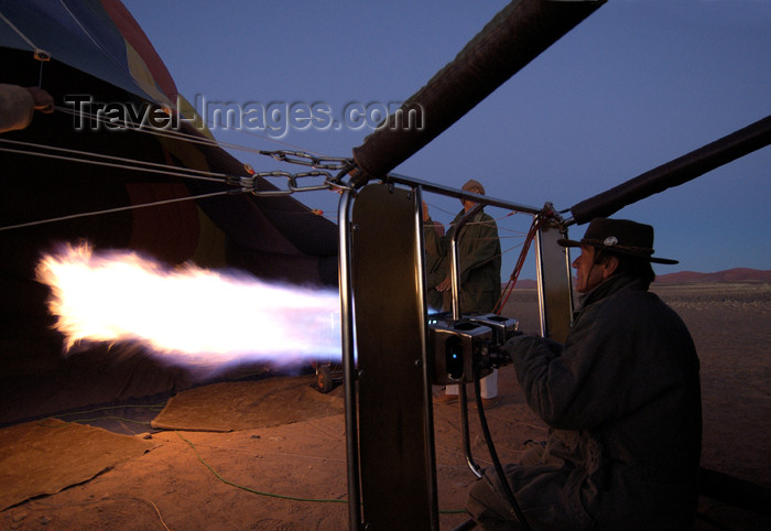 namibia153: Namibia: Hot Air Balloonride preparation - filling the balloon - flames, Sossusvlei - photo by B.Cain - (c) Travel-Images.com - Stock Photography agency - Image Bank