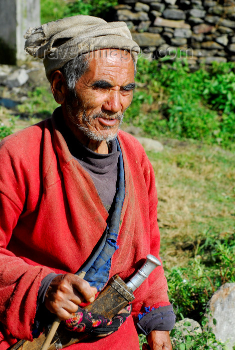 nepal114: Nepal - Langtang region - old Tamang man carring a typical Nepali knife - photo by E.Petitalot - (c) Travel-Images.com - Stock Photography agency - Image Bank