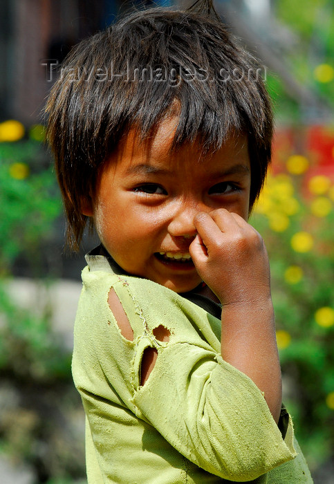 nepal116: Nepal - Langtang region - poor child wipes his nose with fingers - photo by E.Petitalot - (c) Travel-Images.com - Stock Photography agency - Image Bank